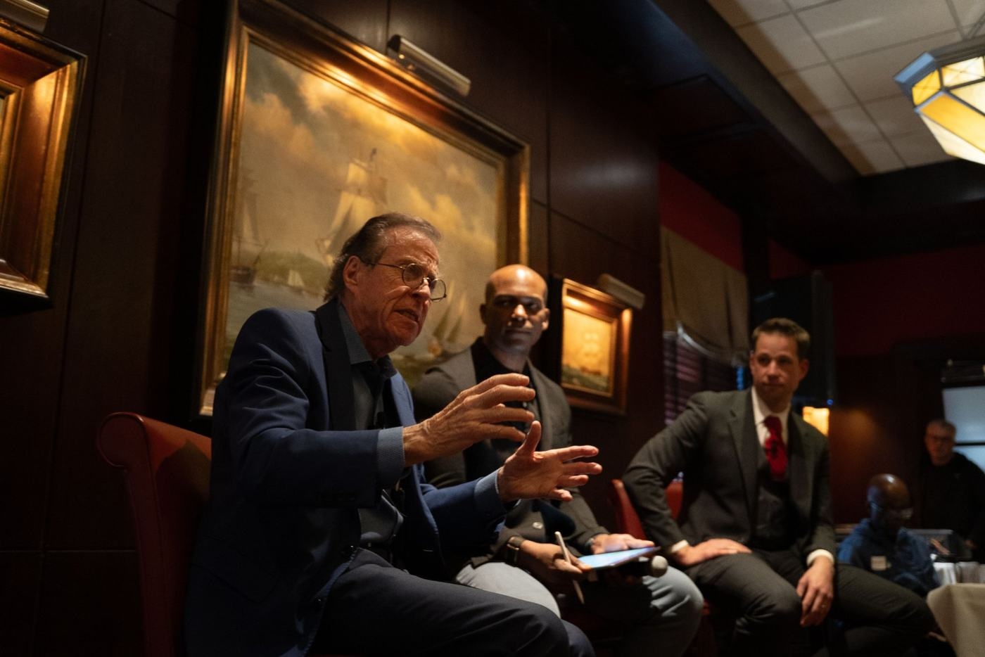 Horst Schulze and Leroy Hite on stage